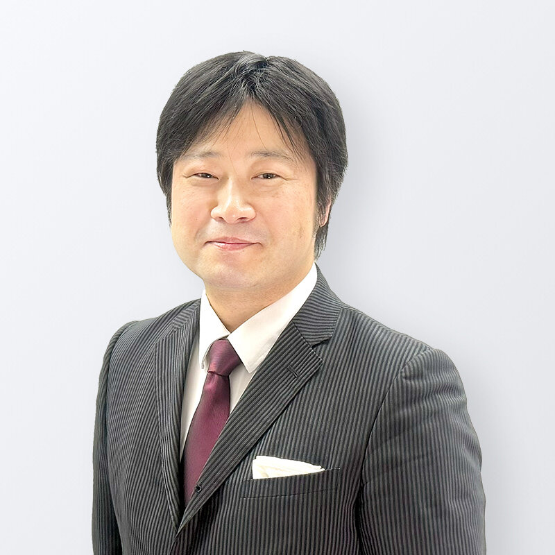 小谷　哲男